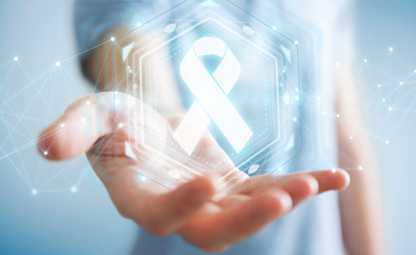 Doctor holding a cancer ribbon vector