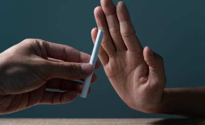 A hand saying no to cigarette