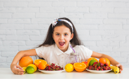 A kid choosing to eat organic and healthy fruits and vegetables