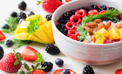 Bowl of freshly cut fruits and berries
