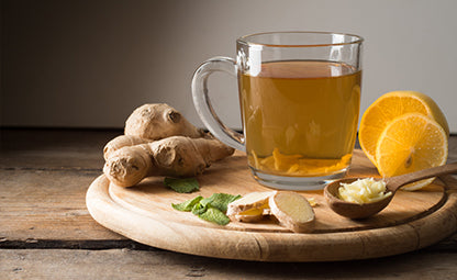 Ginger Tea with raw ginger, lemon and mint