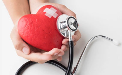 Hands holding heart shape with the stethoscope