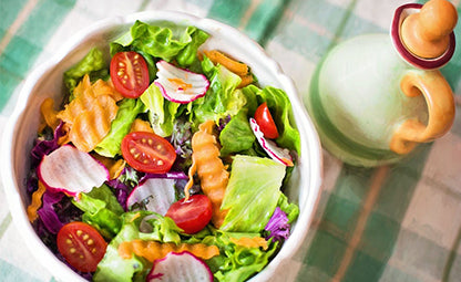 A bowl full of fresh and organic vegetable salad