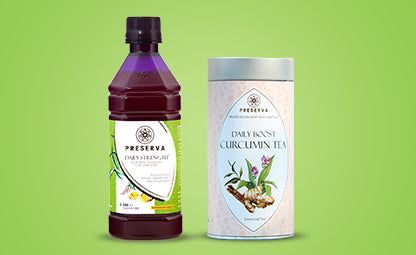 Preserva Wellness Daily Strength Juice and Daily Boost Tea in green background