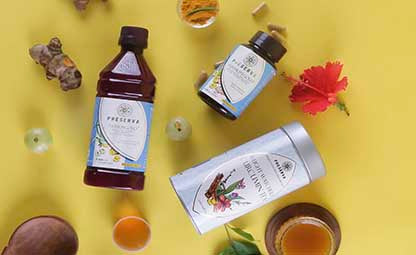 Preserva Wellness Nutrixgold Juice, Turmlite Capsule and Weight Watchers Tea next to organic curcumin, amla, hibiscus