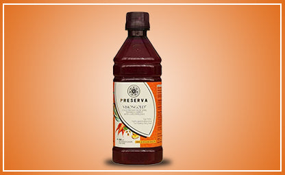Preserva Wellness Visiongold Juice with orange background