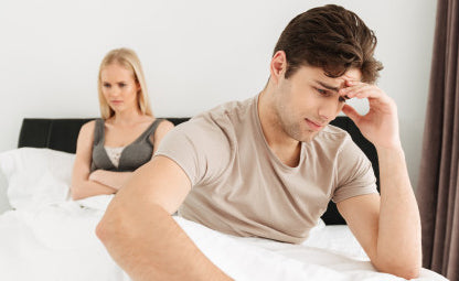 An unhappy couple under stress due to reproductive health problems