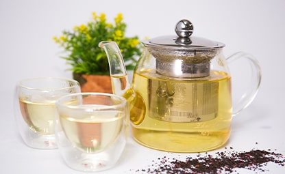 Green Tea in a glass infuser pot and two cups