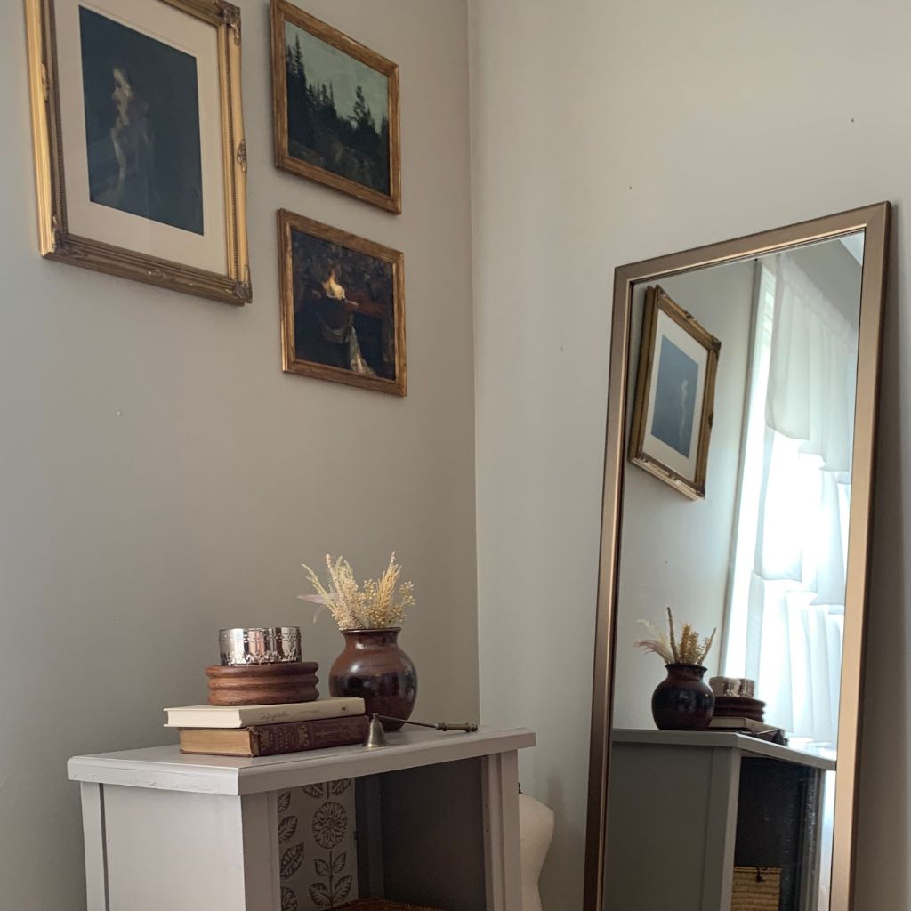 gallery wall with framed mirror