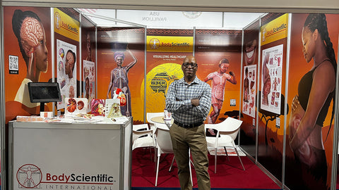 Marcelo Oliver in Africa Health 2022 exhibition with african medical illustration art
