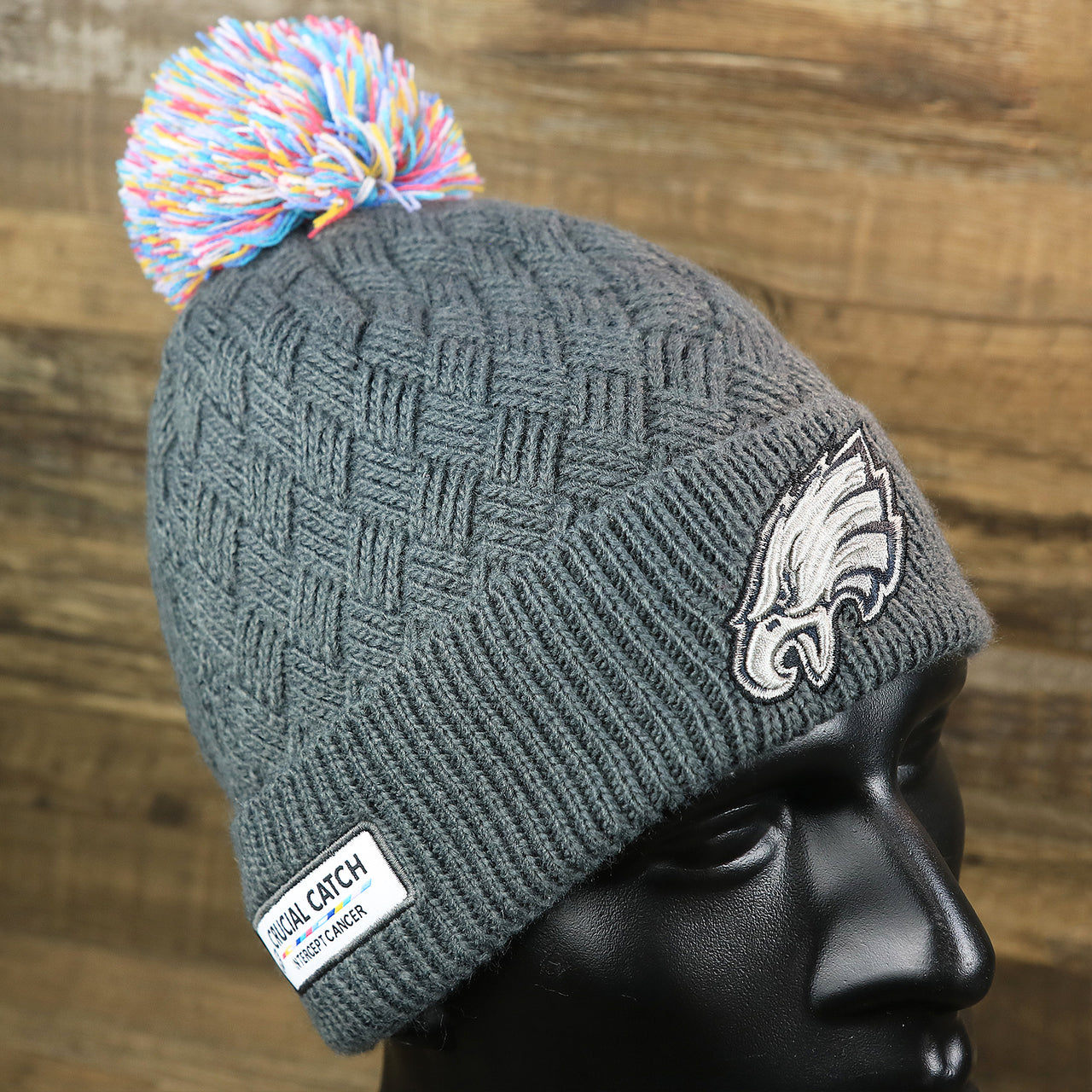 The Women's Philadelphia Eagles On Field NFL Crucial Catch Intercept Cancer Patch Rainbow Pom Pom Winter Beanie | Graphite Gray Winter Beanie