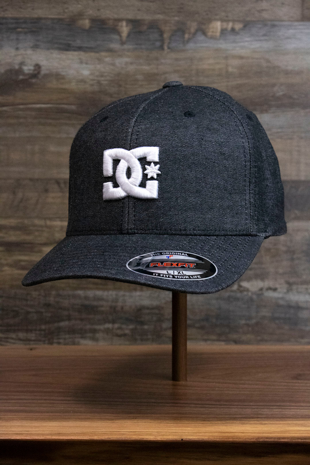 the Dark Gray Bentbrim Skater Hat | DC Shoes Black Bottom Heather Gray Flexfit Cap has a bent brim and heather gray fabric