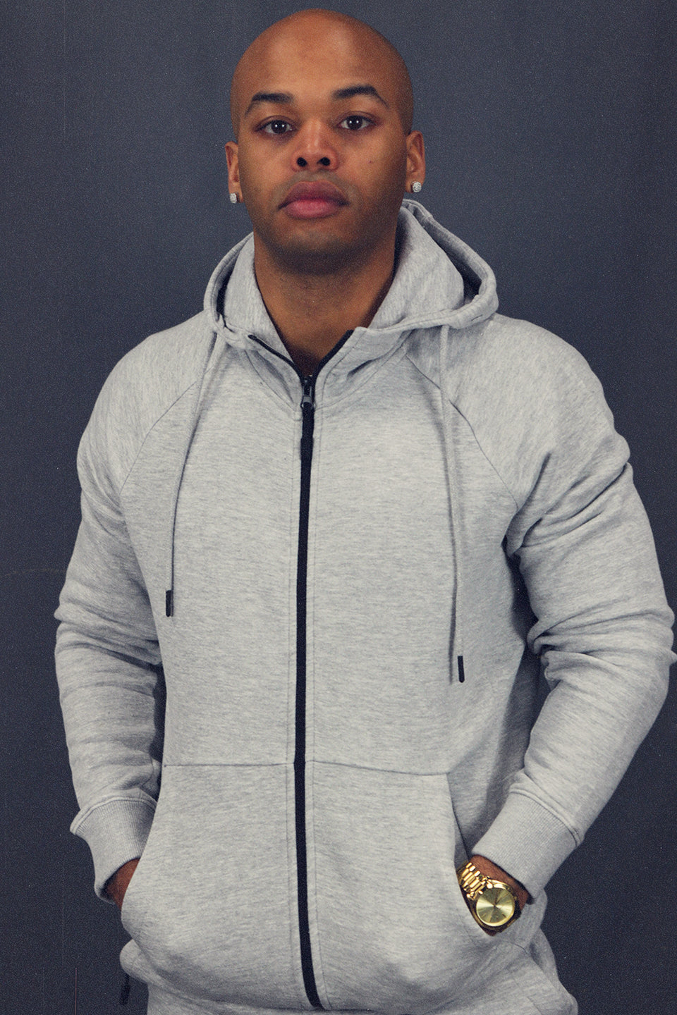 front of the Men's Heather Grey Fleece Zip Up Hoodie Sweatshirt Jogger Top To Match Sneakers