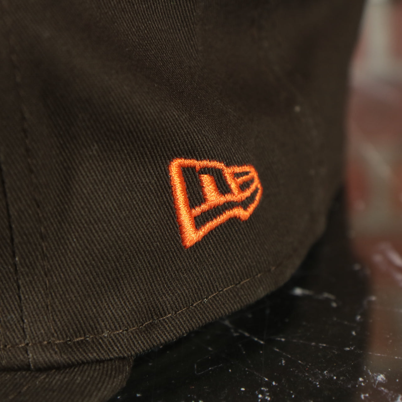 new era logo on the New Era Cleveland Browns 1959-1969 Vintage logo Grey Bottom | Brown 9Fifty Snapback Hat