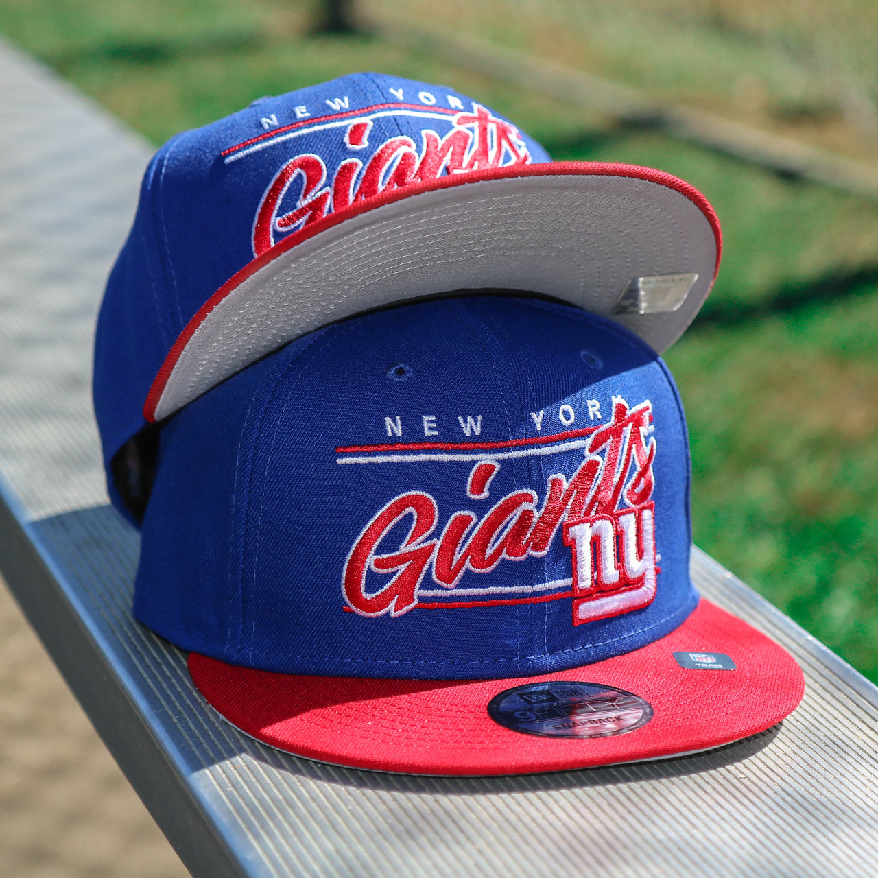 The New York Giants Team Script Gray Bottom 9Fifty Snapback | Royal Blue And Red Snap Cap