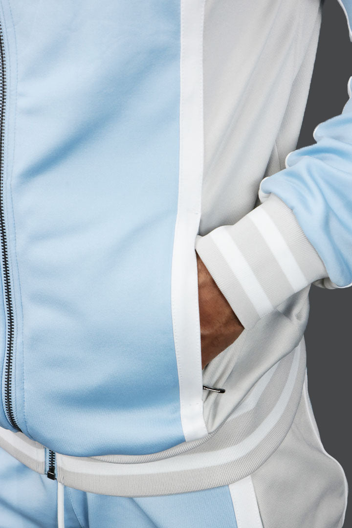 A close up of the zipper pocket on the UNC Basketball Varsity Athletic Track Jacket Jordan Craig