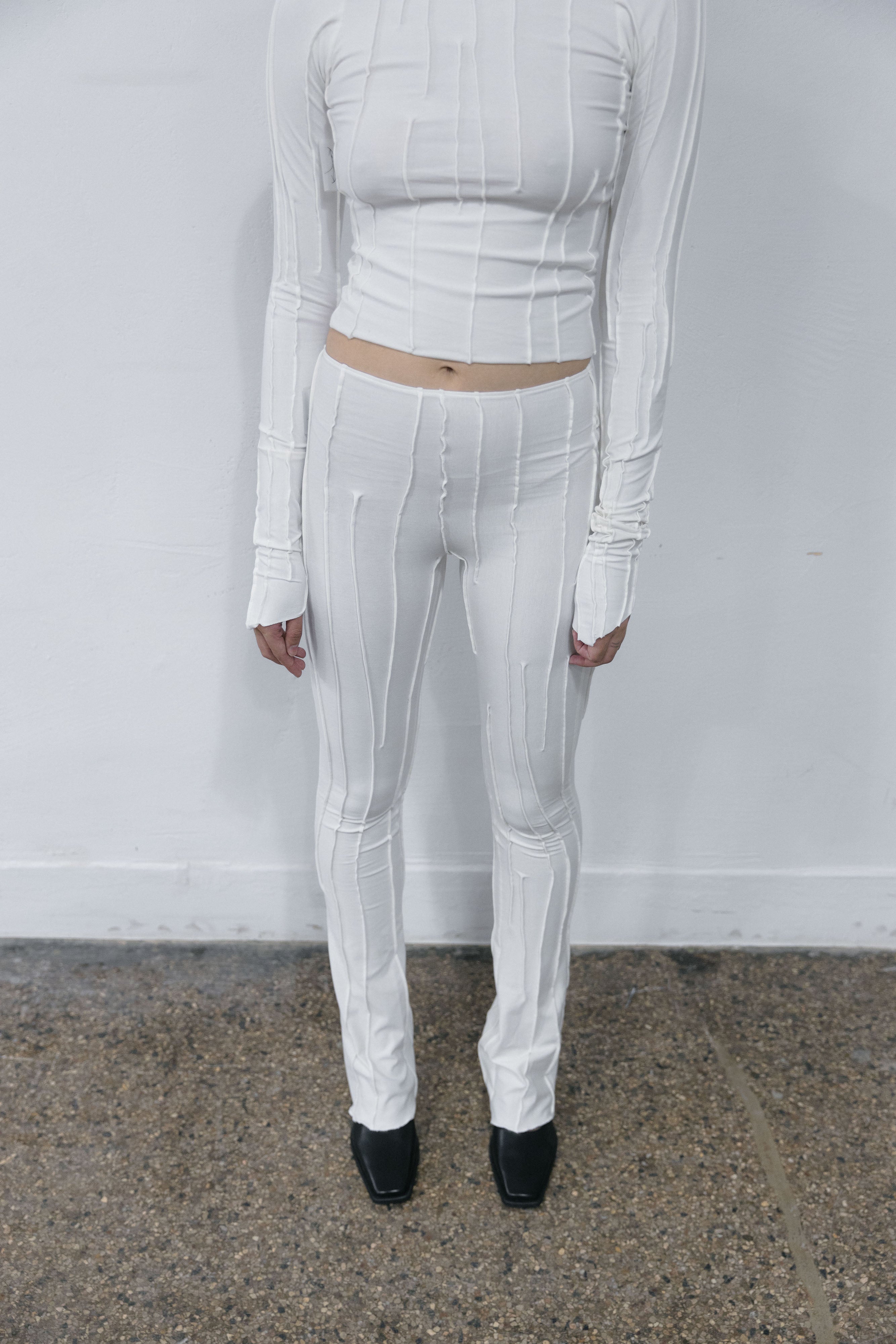 OFF-WHITE ASYMMETRIC FULL SUTURE FLARE PANTS - XS/S fits a XS-M