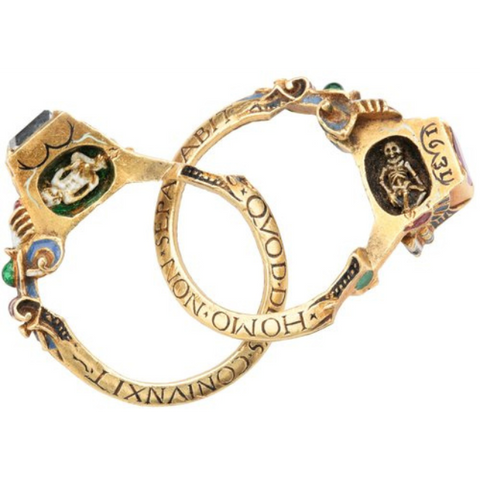 The gimmel ring open to show memento mori - Juraster