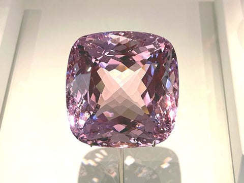 Image of the largest, flawless faceted morganite in the world in magnificent morganite cushion shape