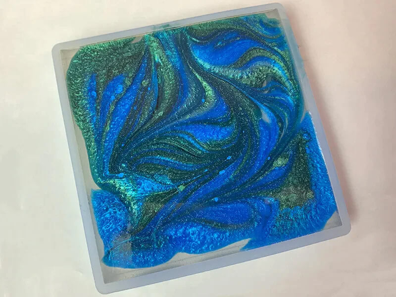 Tinted mica epoxy design in mold