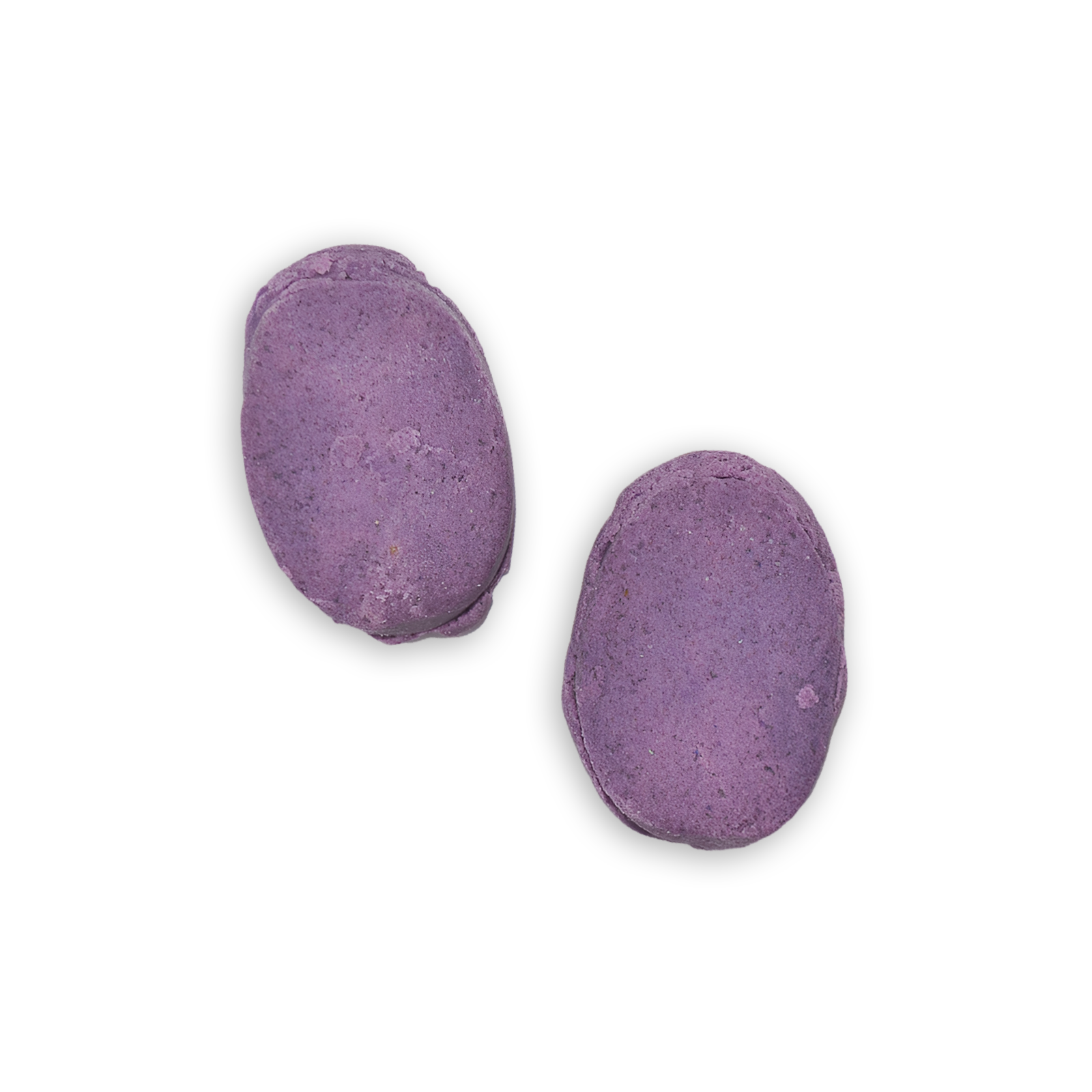 Two oval-shaped, vibrant purple ube soft cookies with a slightly rough, powdery surface, displayed side by side against a solid black background.