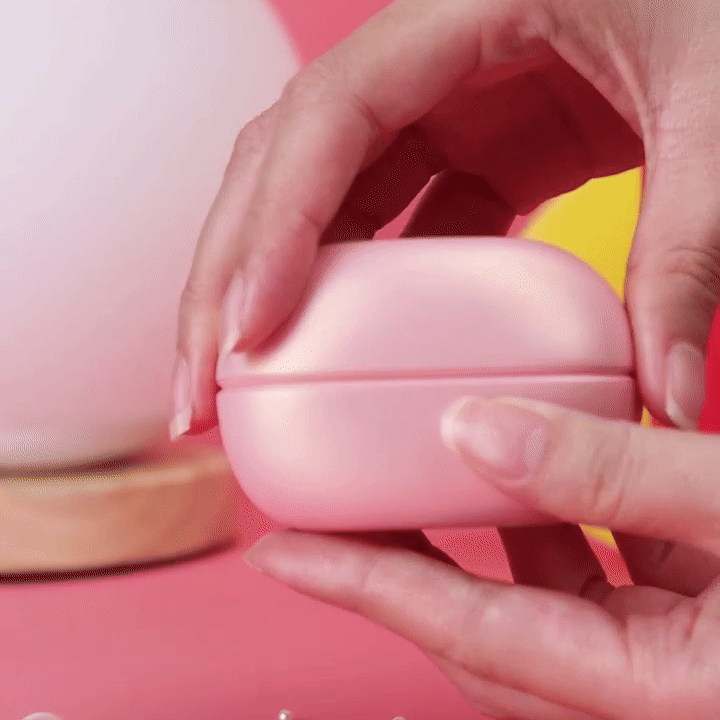 GIF of woman opening up pod of Mini Succulent