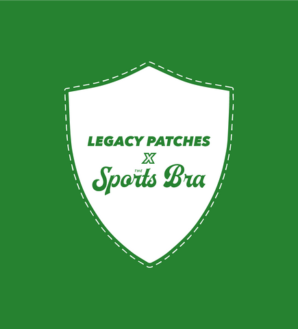 Green shield-shaped patch with 'Legacy Patches X The Sports Bra' text, symbolizing a collaboration.