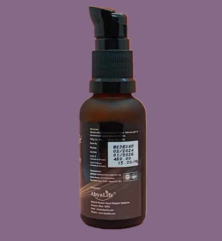 A close-up photo of a white airless pump bottle with a silver cap and a black label. The label text reads "AbyaLife Underarm Serum" in large silver letters, with "For brighter, smoother underarms. Natural ingredients. Clinically tested." written below in smaller white letters.