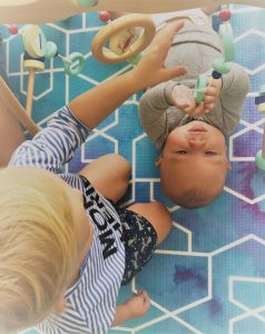Playing on baby play mat