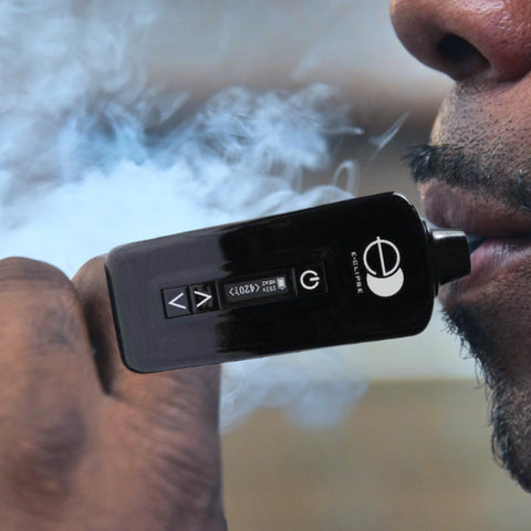 holding the E-Clipse to your mouth for a pull of vapor  