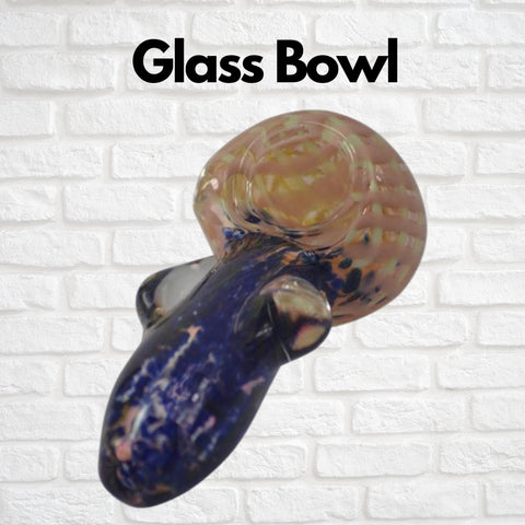 Glass pipe in orange and blue color with text saying glass bowl brick background