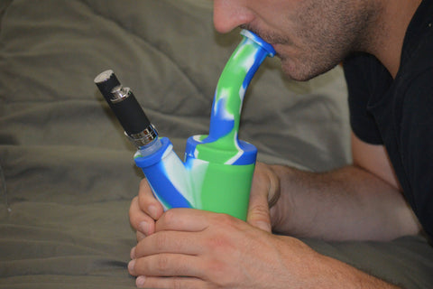 Taking Dab Hits from a Yocan Torch Vaporizer