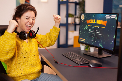 girl excited playing online game