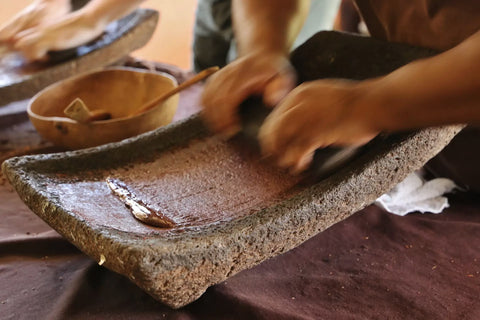 Temptress-Apothecary_Grinding-Cacao-ancient-traditions