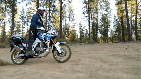 honda africa twin spinning tires and throwing a roost