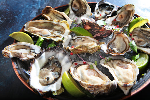 A selection of oysters at an oyster bar