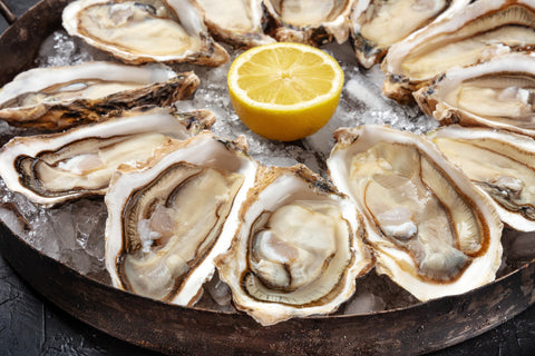 A selection of raw oysters on the half shell