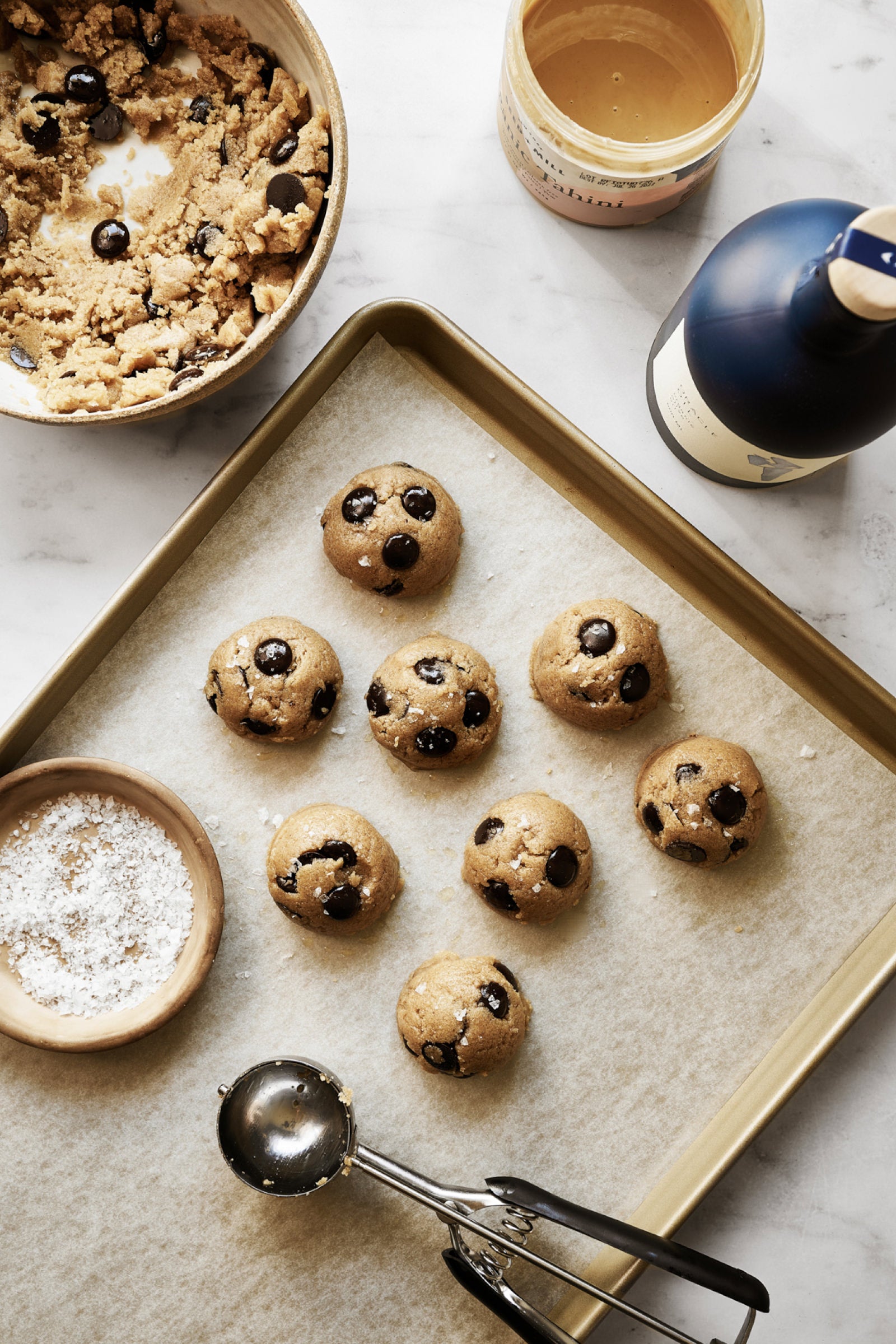 Olive Oil Tahini Chocolate Chip Cookies on a baking sheet