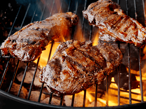 Steaks on a grill