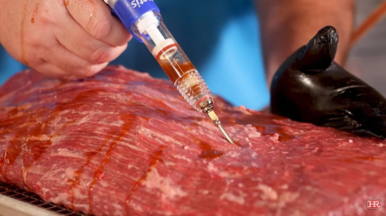 Heath Riles Injecting a Brisket