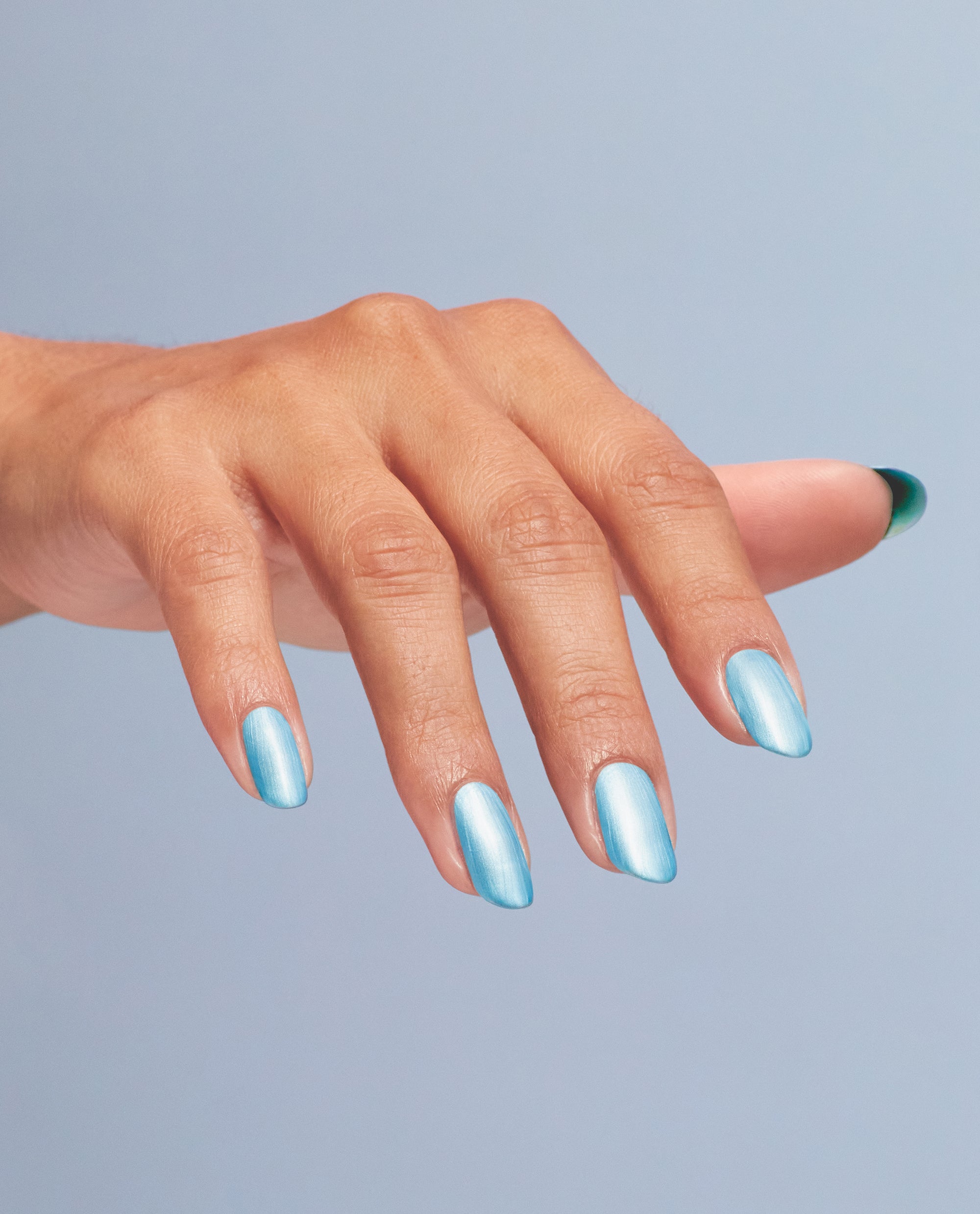 Premium Photo | Vegan sky blue matte nail polish