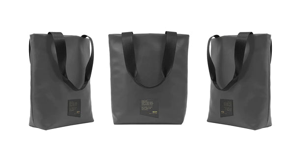 Three mile-end tote bags at different angles, against a white background. The tote bags are made with black cactus leather