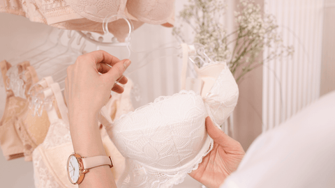 photo of a bra being looked at in a store