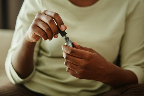 Best non toxic nail polish. Woman applies nail polish.