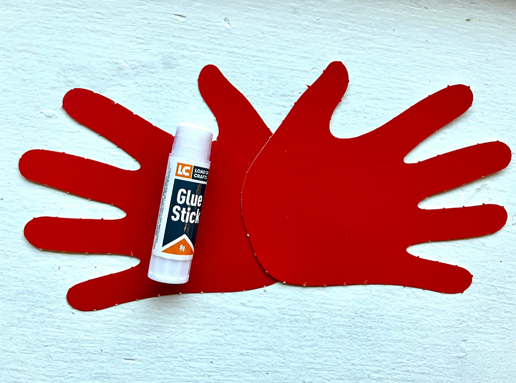  Glue the hands together first by overlapping the palms