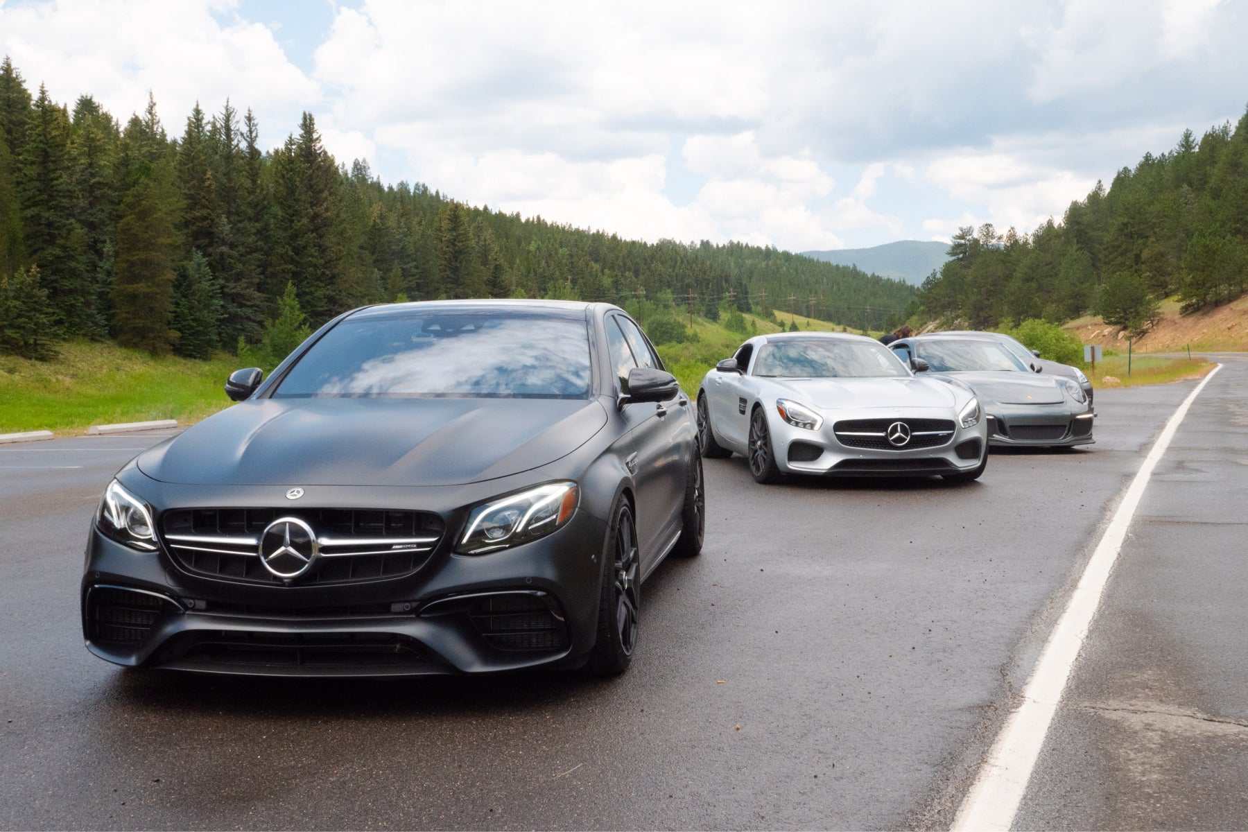 An image of cars on the track, a racing experience is the perfect gift for car lovers