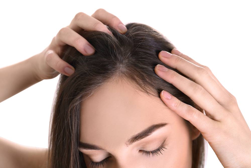 Quels sont les symptômes du psoriasis des cheveux ?-1