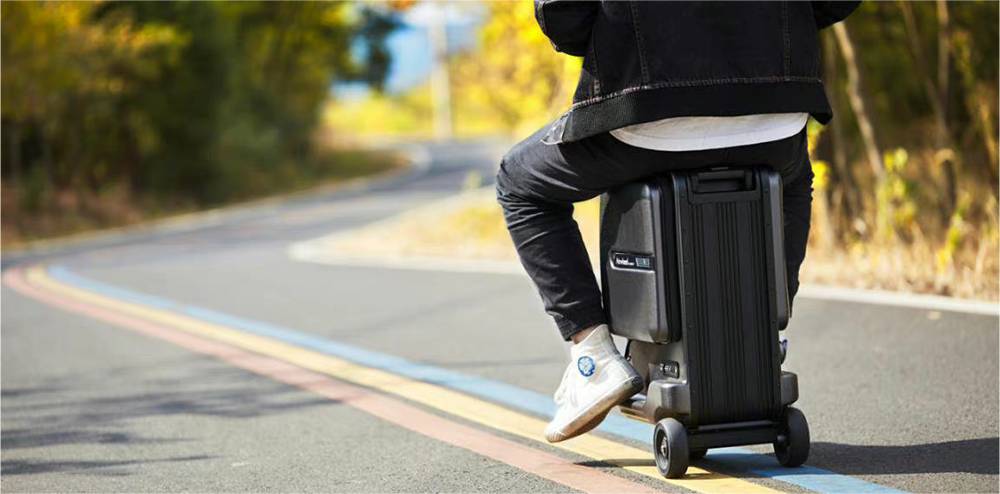 airwheel-factory-blog-airwheel-rideable-suitcase-scooter-for-adults-prevails-in-the-world-photo-05