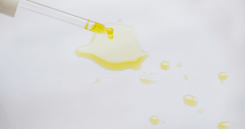 Squalane oil drops from pipette