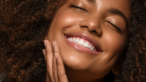 Black woman smiling | Jenny Nordic Skincare